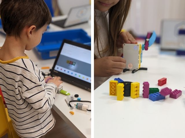 две деца работят върхо построяване на лего робот - снимка